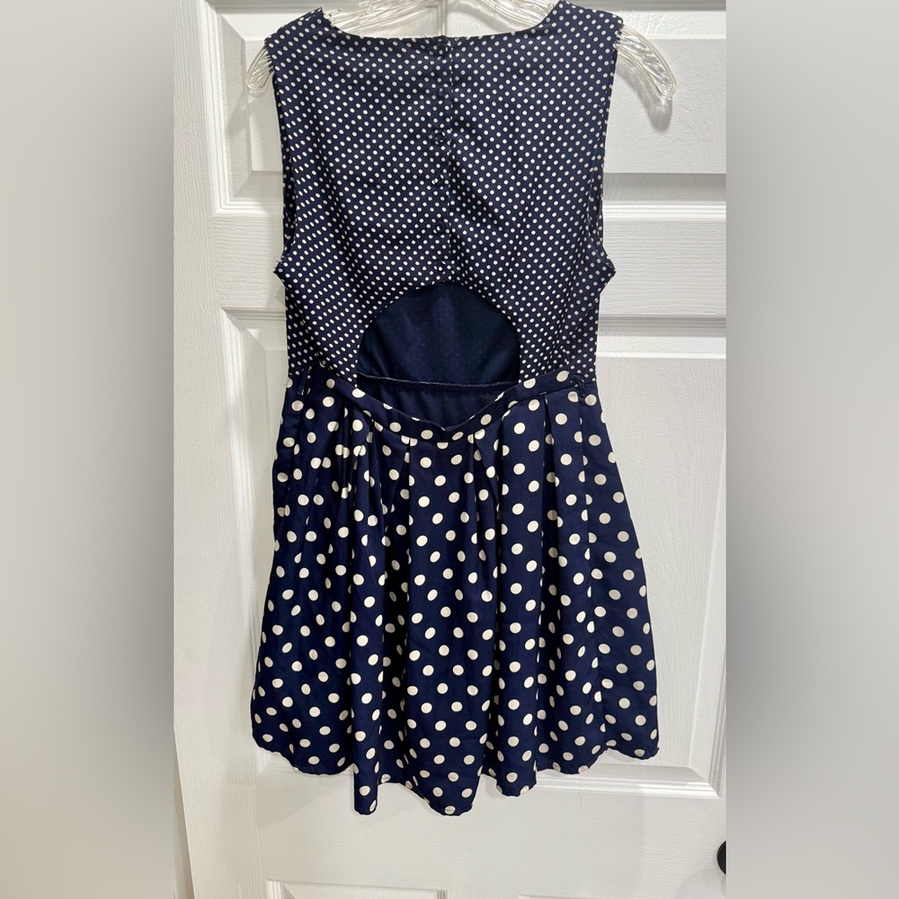 Charming Charlie navy blue off white polka dots open back size med